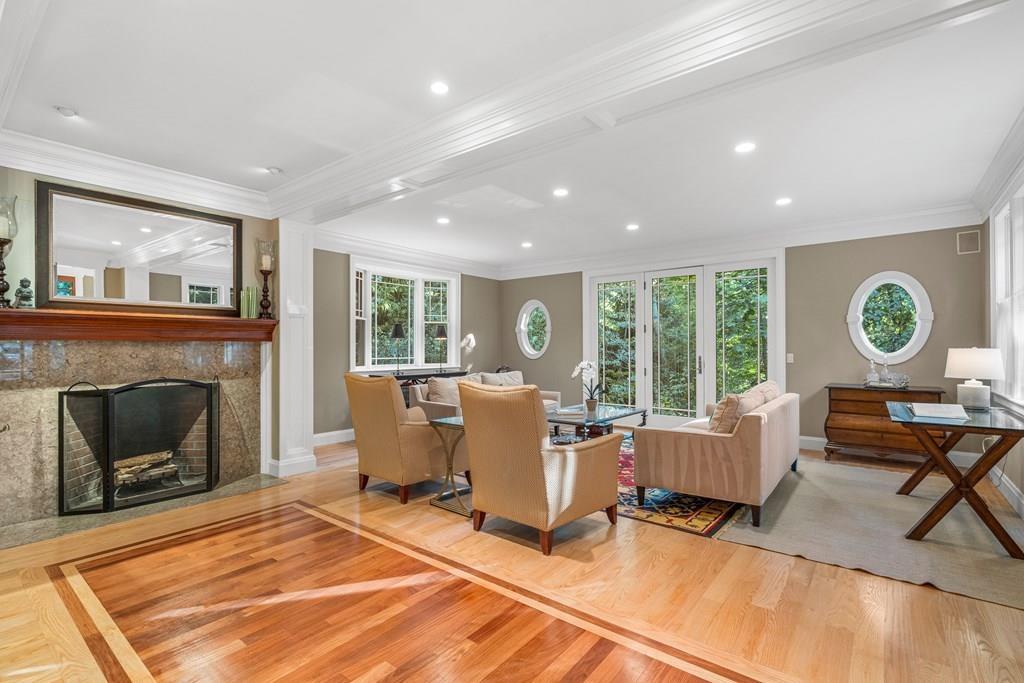 150 Wellesley Street Weston, MA 02493 - Photo 3 of 31 a living room with furniture a window and a fireplace
