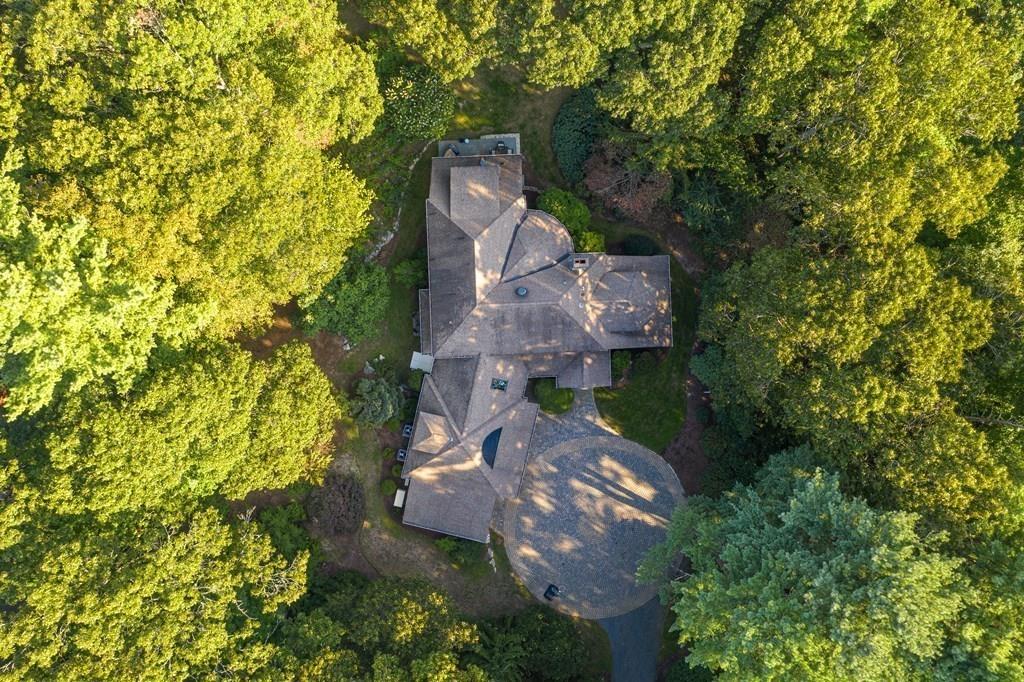 150 Wellesley Street Weston, MA 02493 - Photo 31 of 31 an aerial view of a house with swimming pool and garden space