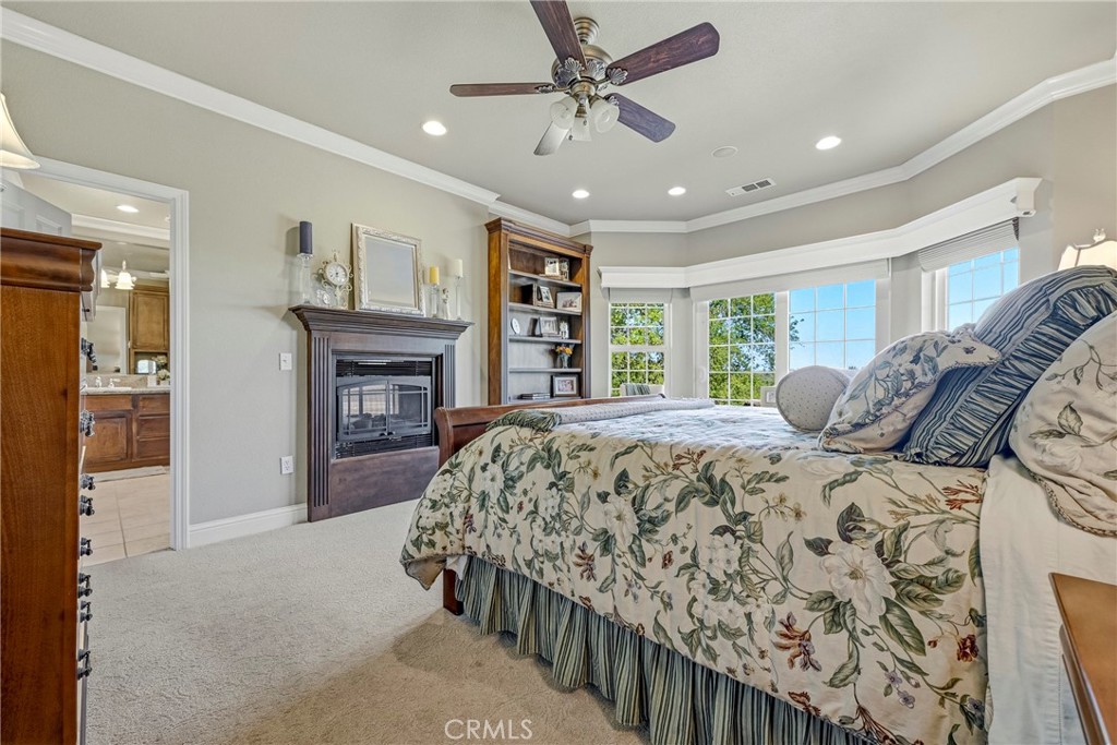 11126 Livingston Cressey Road Livingston, CA 95334 - Photo 28 of 75 Master bedroom with fireplace and built in shelves