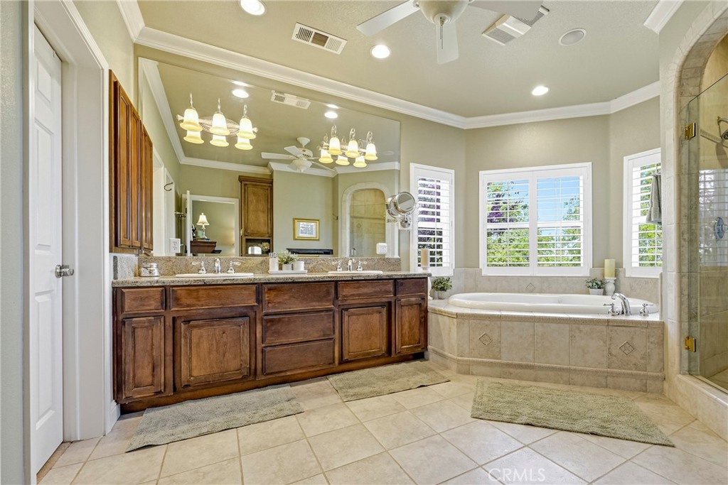 11126 Livingston Cressey Road Livingston, CA 95334 - Photo 31 of 75 Master jetted tub with large walk in shower with three shower heads