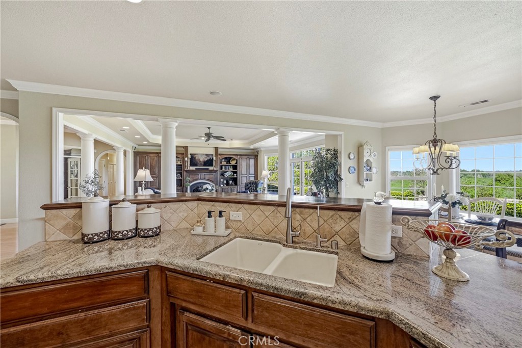 11126 Livingston Cressey Road Livingston, CA 95334 - Photo 38 of 75 View of family room & farmland all at the kitchen sink