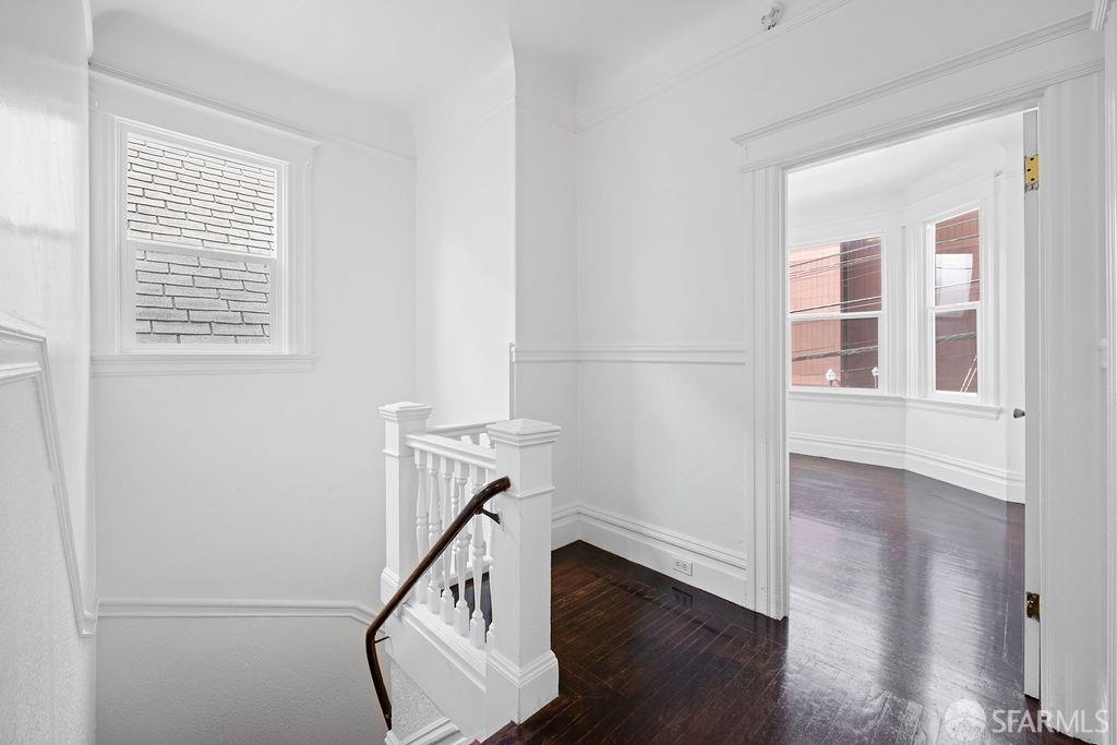 2401 23rd Street San Francisco, CA 94110 - Photo 26 of 76 a view of entryway with wooden floor and stairs