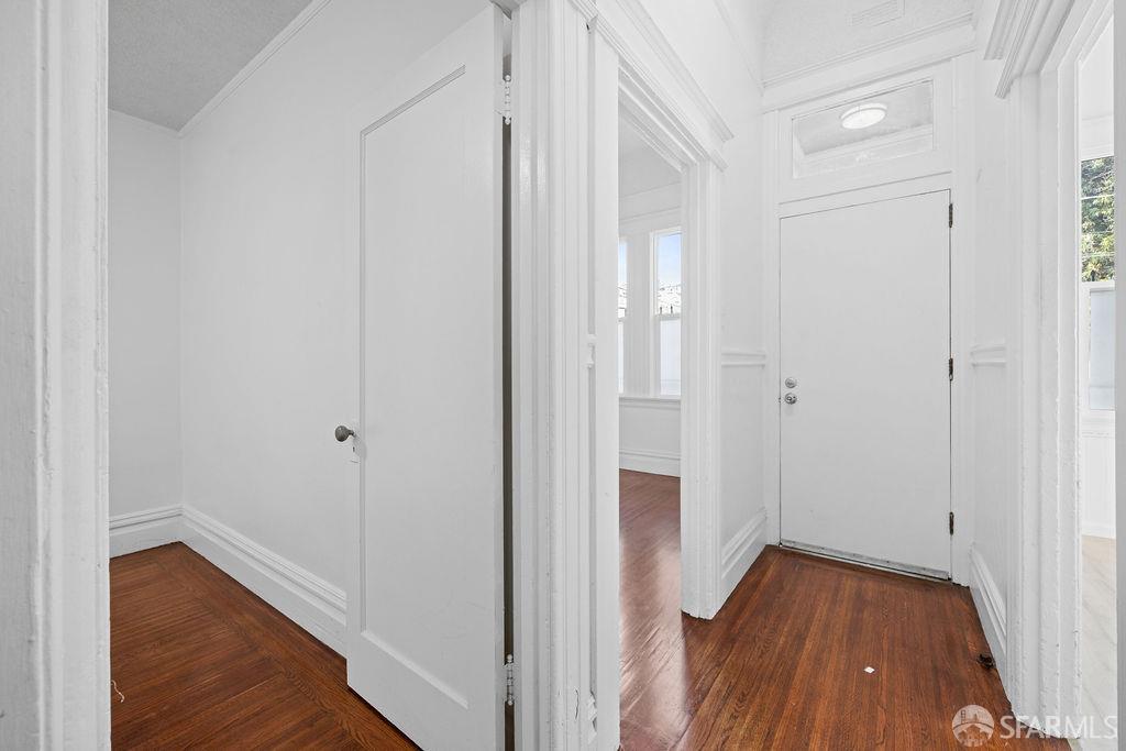 2401 23rd Street San Francisco, CA 94110 - Photo 5 of 76 a view of a hallway with wooden floor