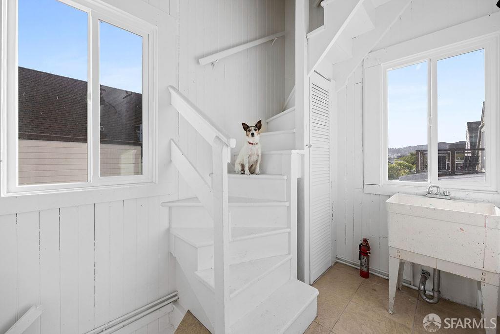 2401 23rd Street San Francisco, CA 94110 - Photo 54 of 76 a bathroom with a sink and a mirror