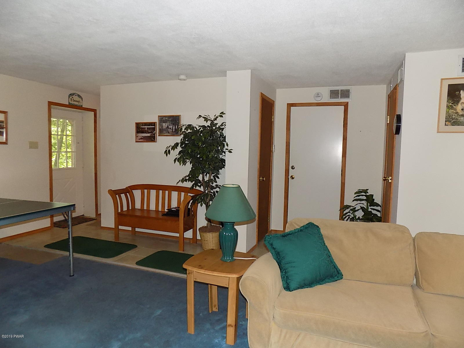1034 Sundew Road Lake Ariel, PA 18436 - Photo 36 of 63 Fam Rm w/Walkout to Front Farking !
