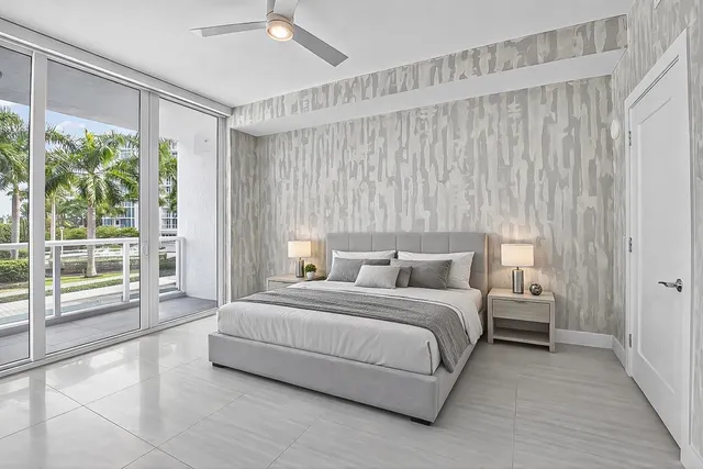 a very nice looking living room with furniture and a large window