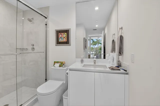 a view of a park with palm trees