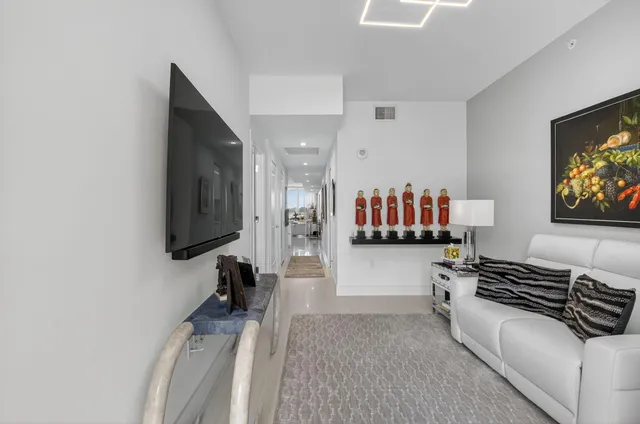 a view of swimming pool with outdoor seating