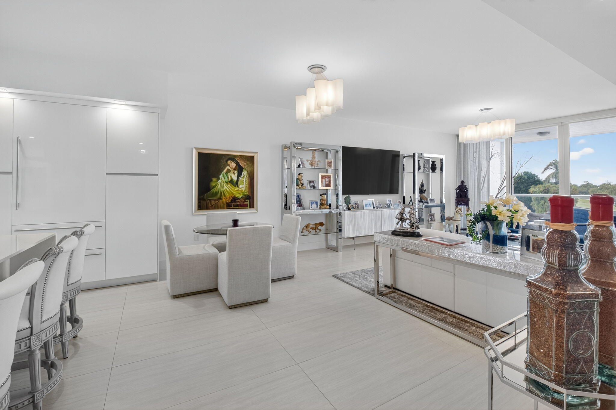 20155 Boca W Drive, Unit C205 Boca Raton, FL 33434 - Photo 7 of 122 a living room with furniture and a flat screen tv