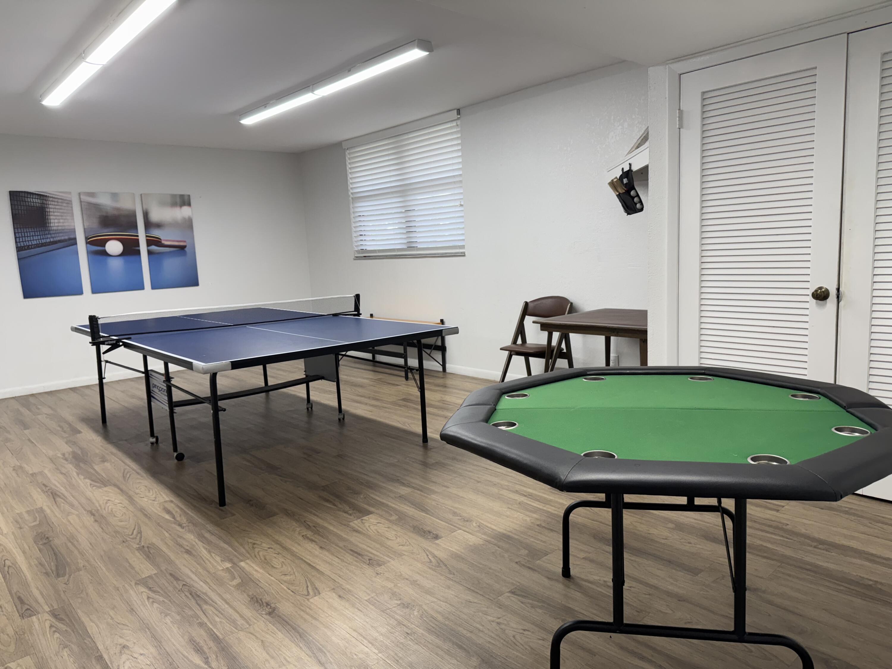 2430 DC Country Club Boulevard, Unit 4072 Deerfield Beach, FL 33442 - Photo 24 of 28 a room with furniture and wooden floor