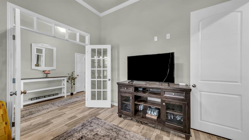 2023 Jo Jones Lane Springtown, TX 76082 - Photo 5 of 25 a living room with furniture and a flat screen tv