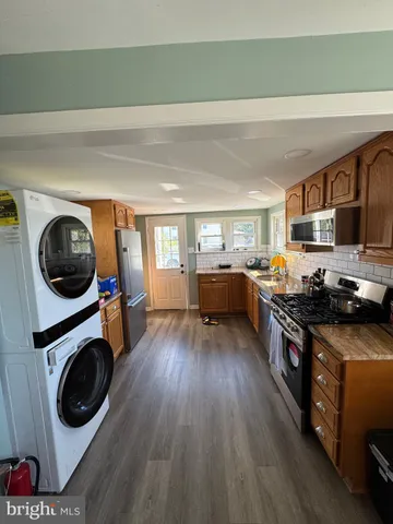 a bathroom with a sink and a shower