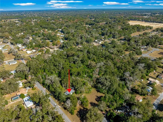a view of a yard with an outdoor space