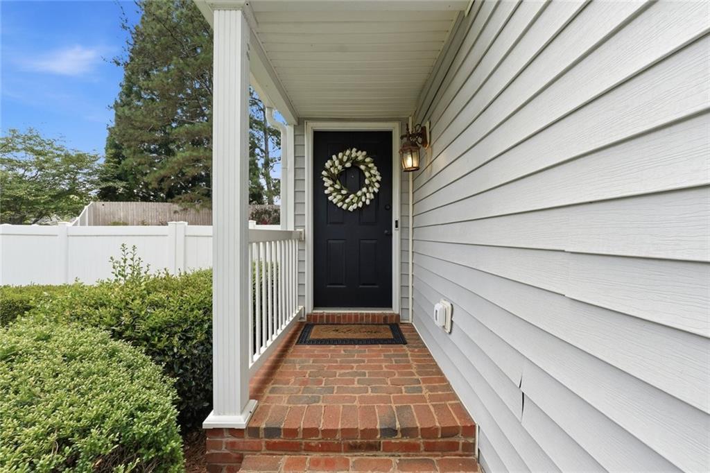 1001 Daventry Crossing Woodstock, GA 30188 - Photo 3 of 22 a view of a house with a door
