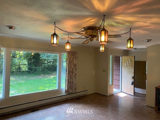 230 Frank Smith Road Toutle, WA 98649 - Photo 5 of 19 a view of a room with a window and chandelier