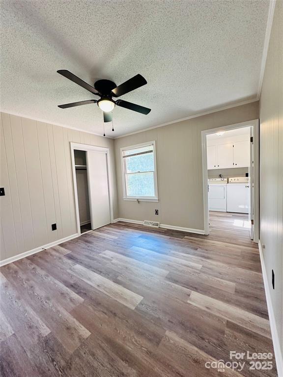 5904 Highway 70 Old Fort, NC 28762 - Photo 4 of 11 a view of empty room with wooden floor and fan