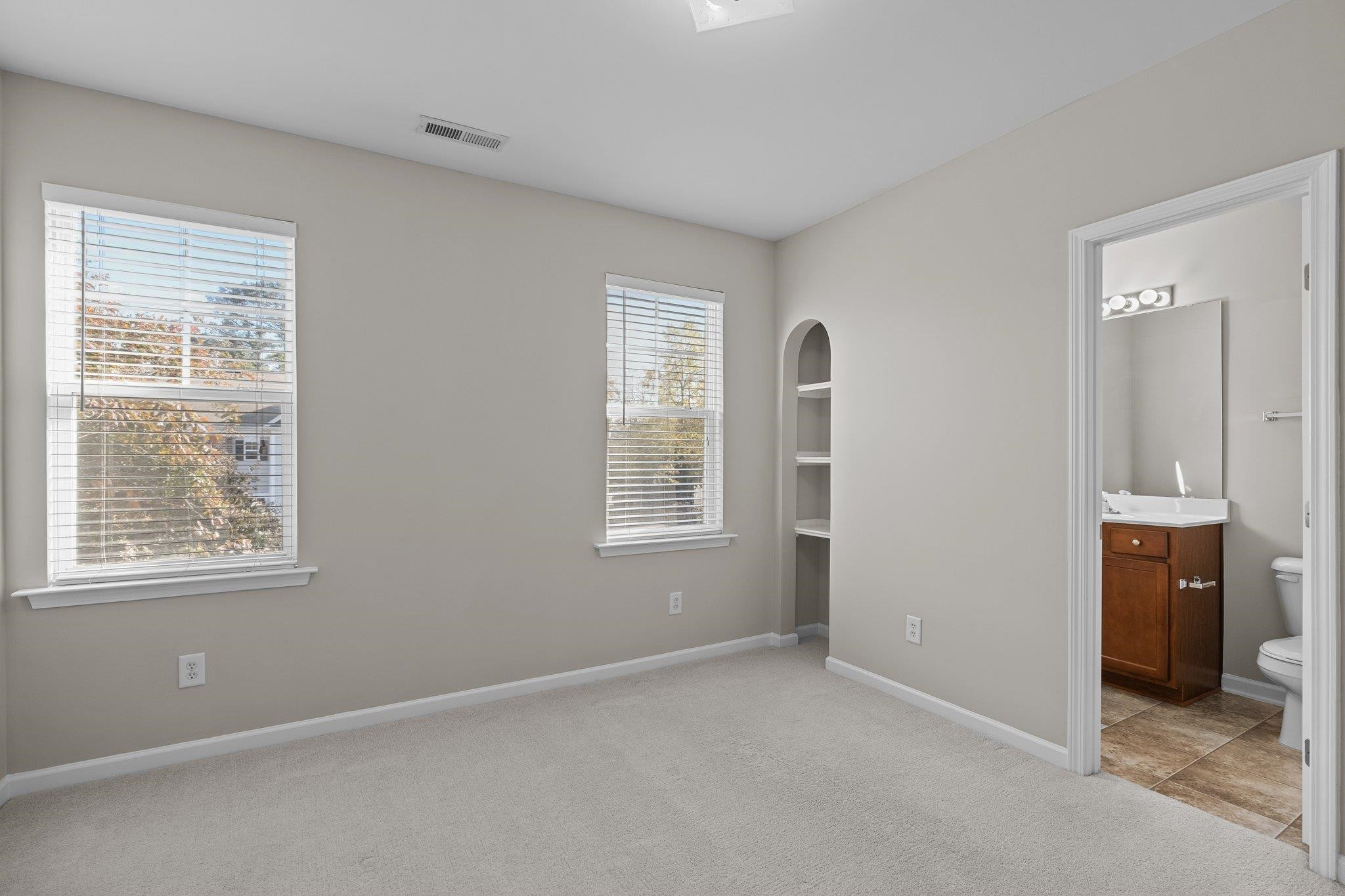 6705 Morgantown Street Raleigh, NC 27616 - Photo 16 of 40 a view of an empty room with a window