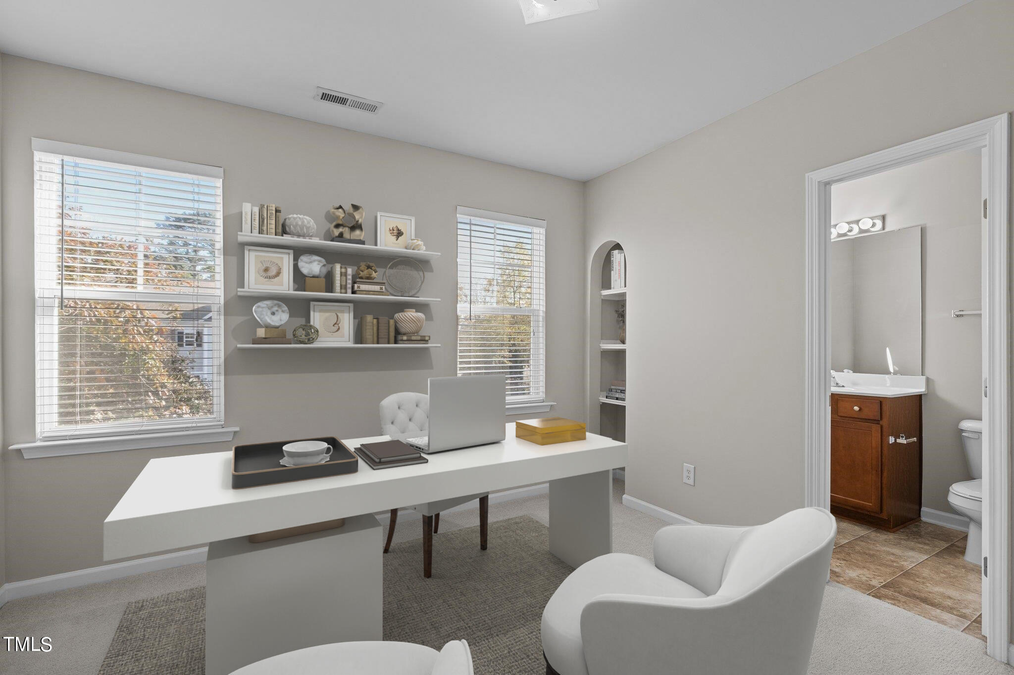 6705 Morgantown Street Raleigh, NC 27616 - Photo 19 of 40 a room with a workspace