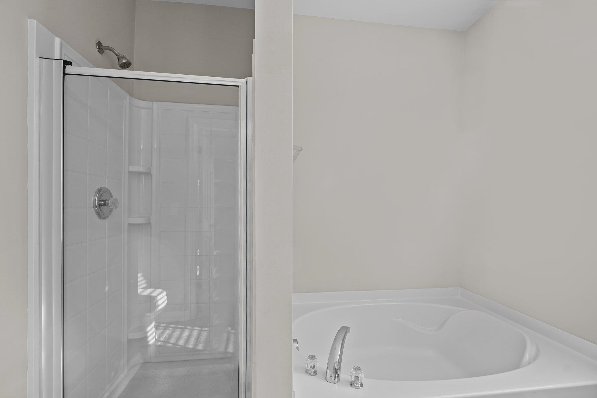6705 Morgantown Street Raleigh, NC 27616 - Photo 28 of 40 a bathroom with a bathtub