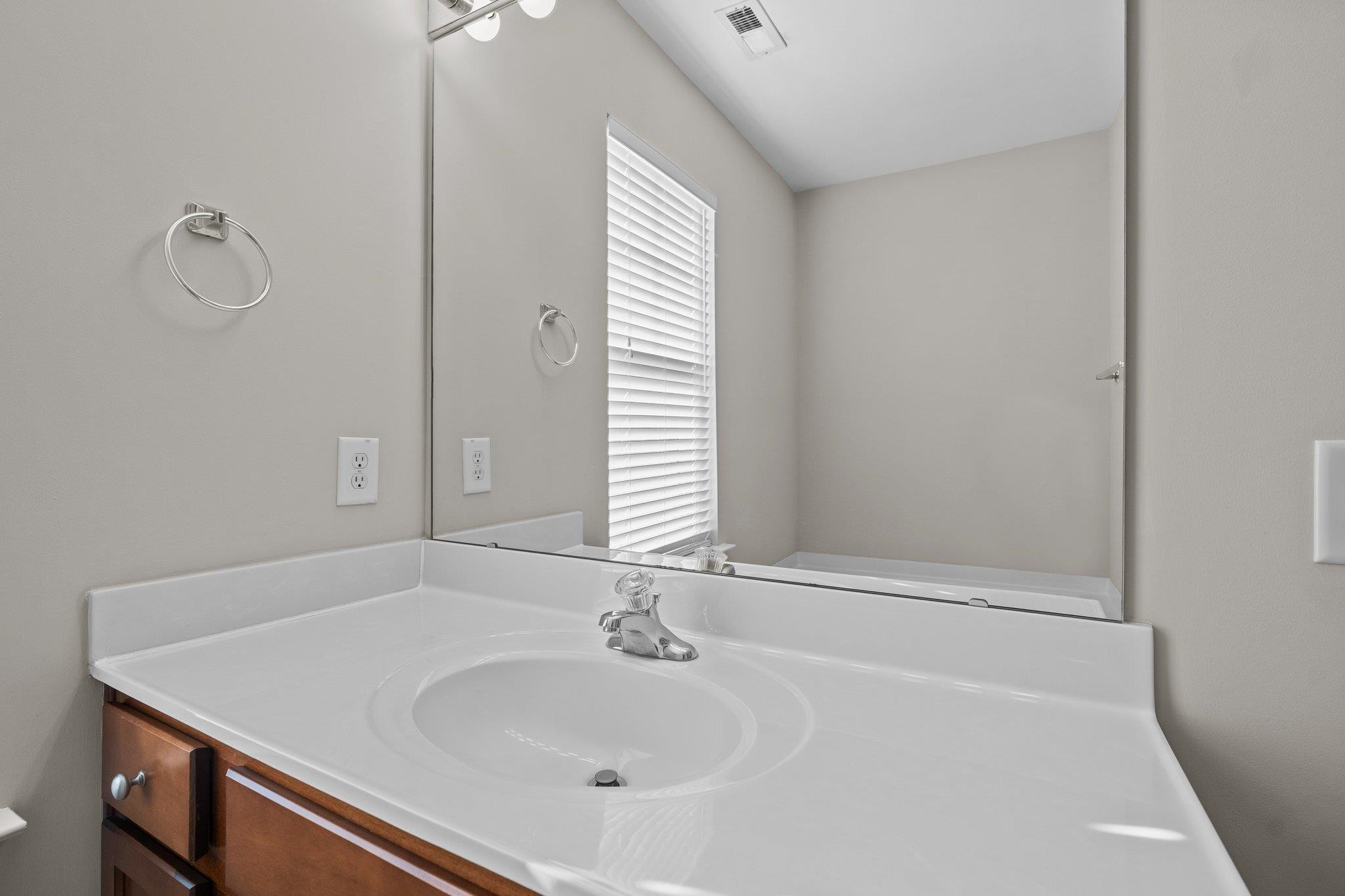 6705 Morgantown Street Raleigh, NC 27616 - Photo 29 of 40 a bathroom with a sink and a bathtub