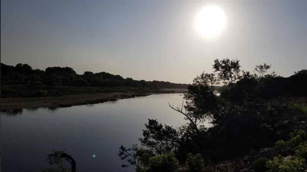 144 River Cyn Road Palo Pinto, TX 76484 - Photo 2 of 9 a view of lake from balcony