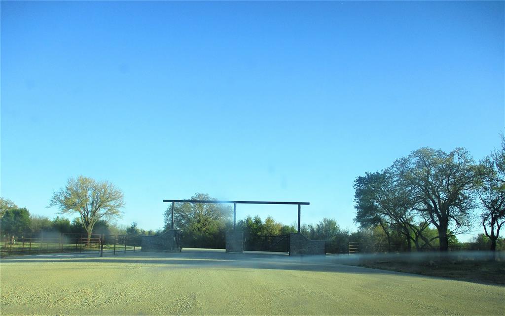 144 River Cyn Road Palo Pinto, TX 76484 - Photo 8 of 9 a view of lake with a yard
