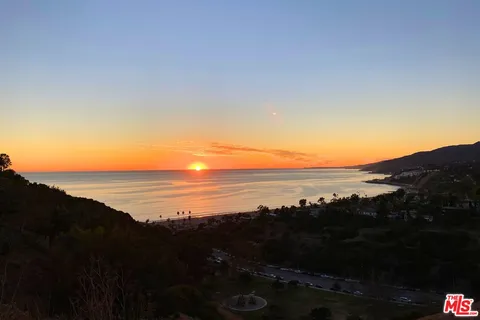 a view of lake and mountain