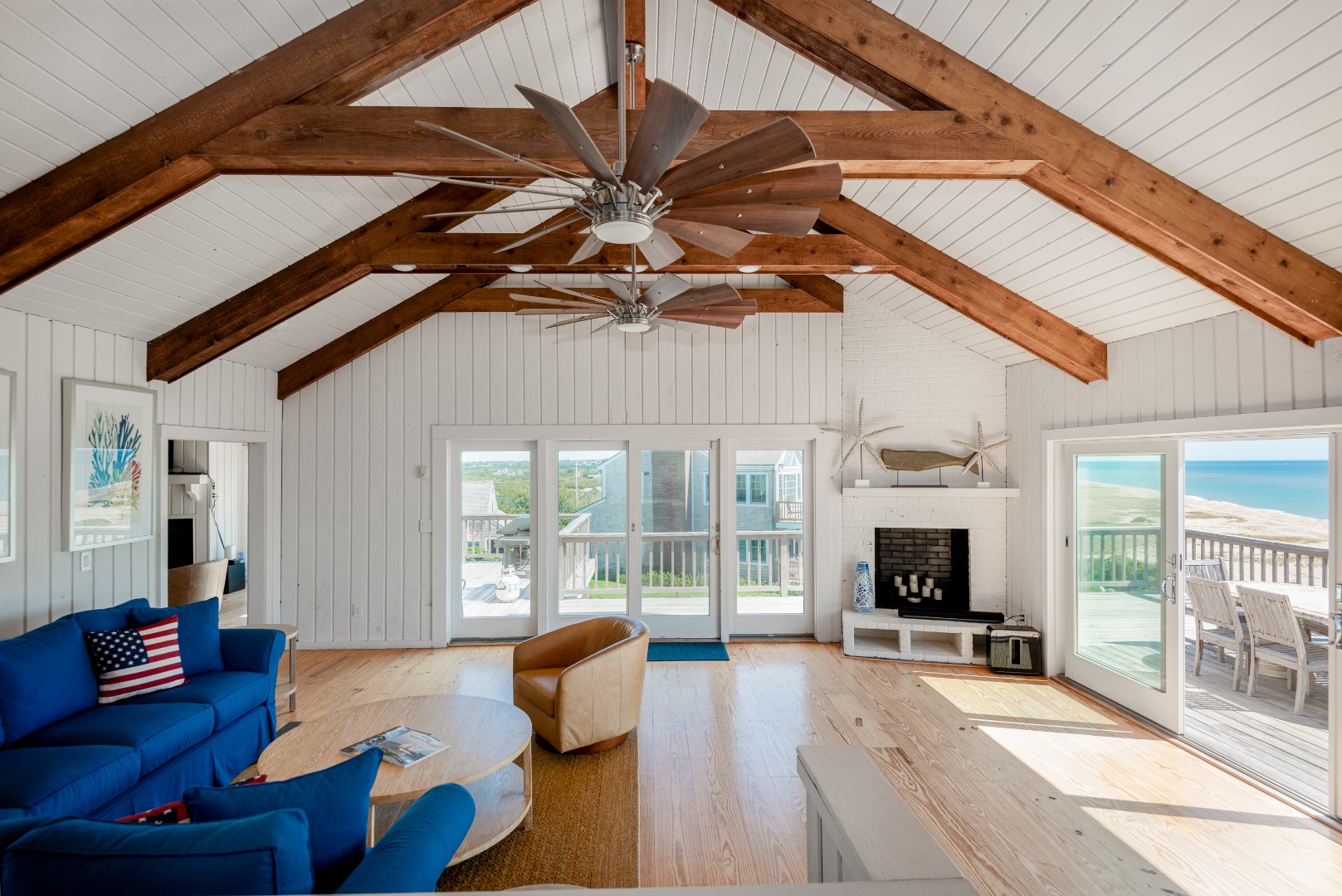 1 Reeds Way Nantucket, MA 02554 - Photo 26 of 51 a living room with furniture and a fireplace