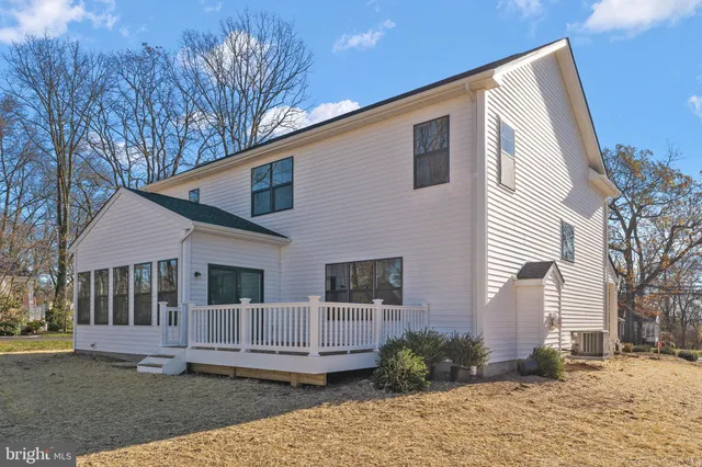 a front view of a house with a porch