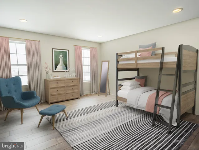 a view of swimming pool with seating area