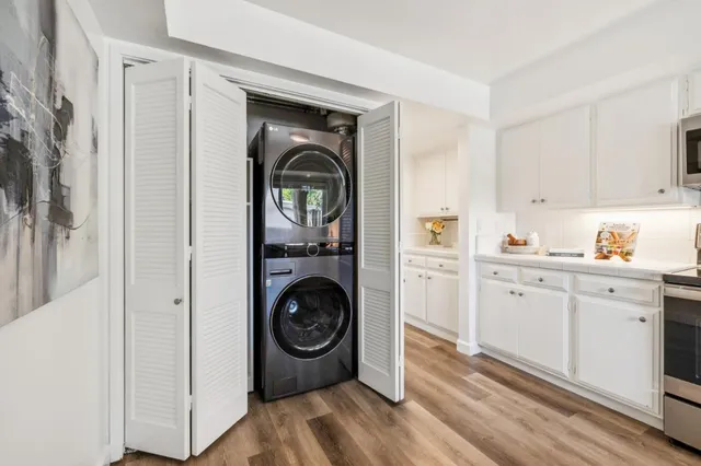 a view of balcony with wooden floor and bench