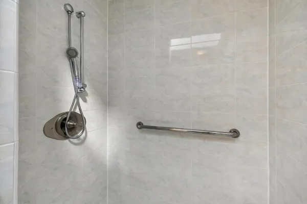 a bathroom with a sink a vanity and a mirror