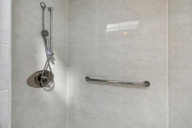 a bathroom with a sink a vanity and a mirror