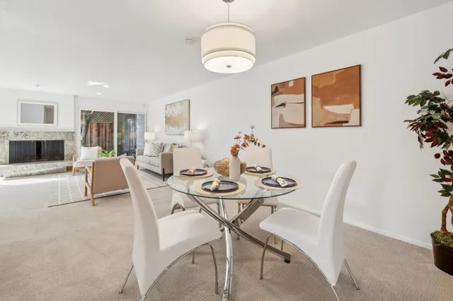 a view of a dining room with furniture