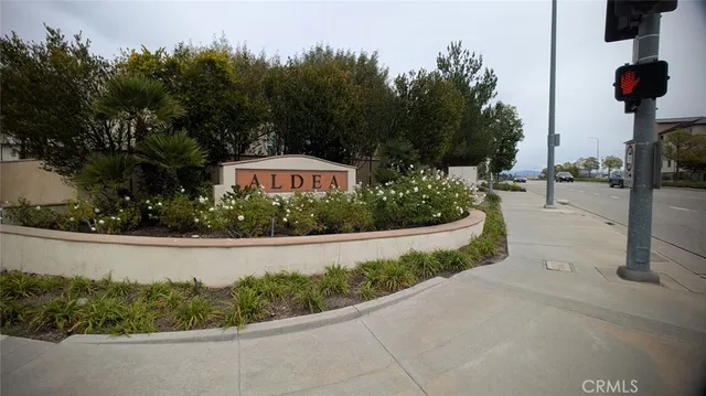 a view of a street with a building in the background