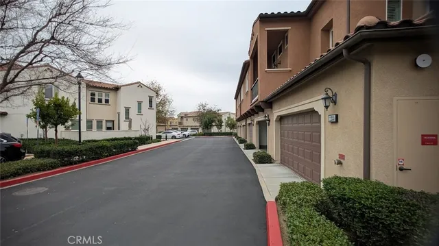 a view of a street in front of a house