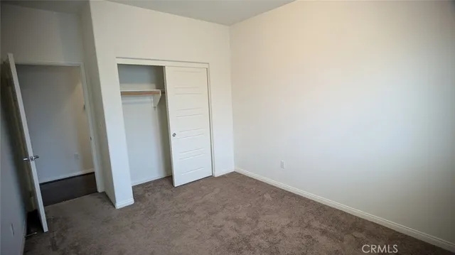 an empty room with closet