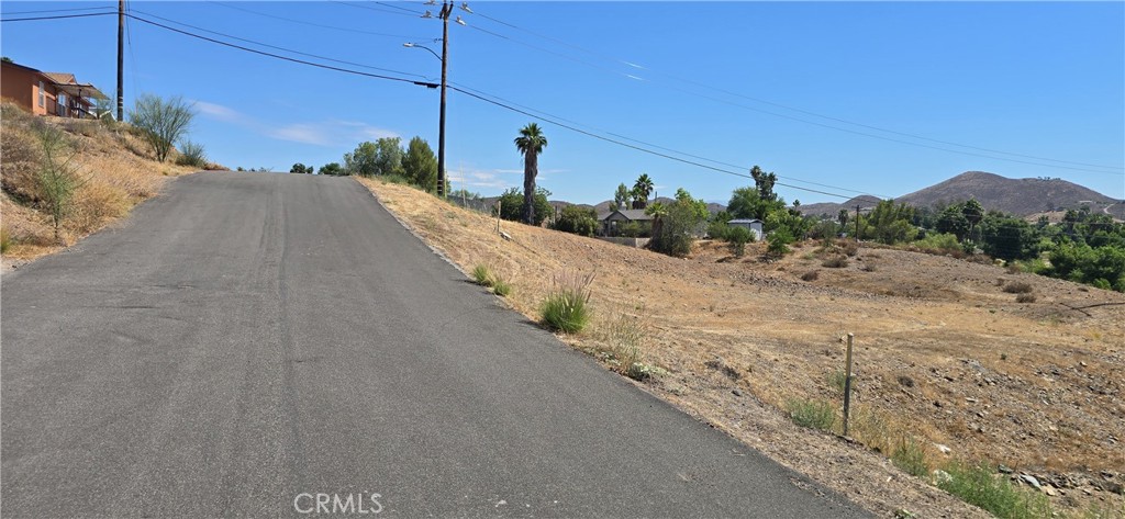 0 Nevada Drive Menifee, CA 92587 - Photo 4 of 4 a view of a road with a building in the background