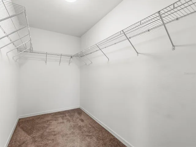 a view of a room with racks on the wall