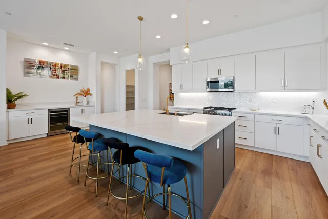 a room with sink and mirror