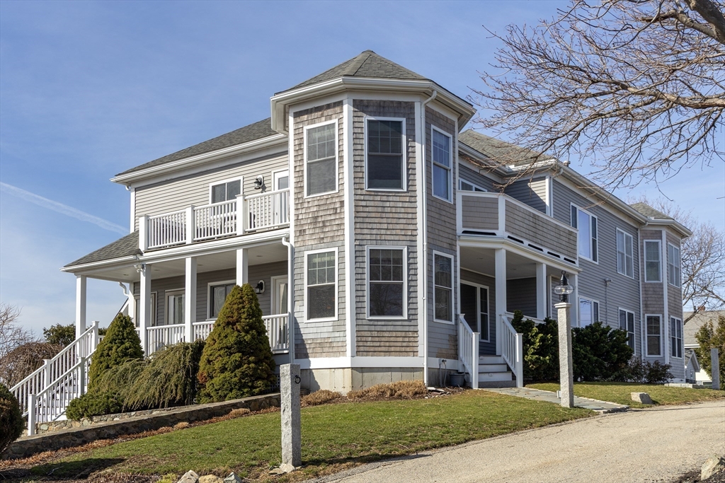 9 Meade Avenue, Unit 1 Hull, MA 02045 - Photo 1 of 34 front view of a house with a yard