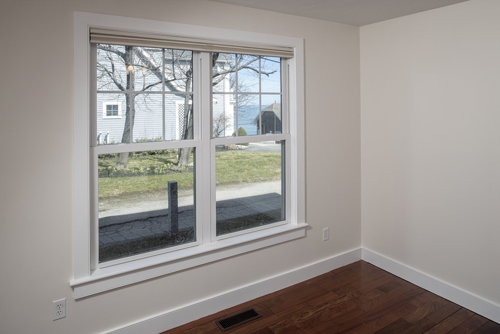 9 Meade Avenue, Unit 1 Hull, MA 02045 - Photo 14 of 34 a view of a room that has a window in it