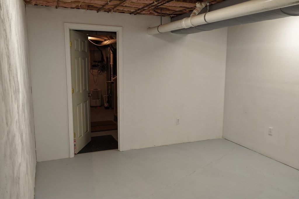 9 Meade Avenue, Unit 1 Hull, MA 02045 - Photo 27 of 34 an empty room with closet