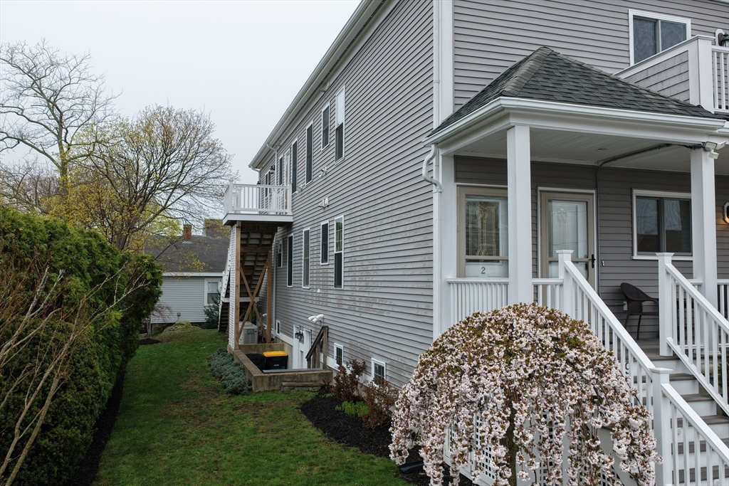 9 Meade Avenue, Unit 1 Hull, MA 02045 - Photo 31 of 34 a view of a house with a yard
