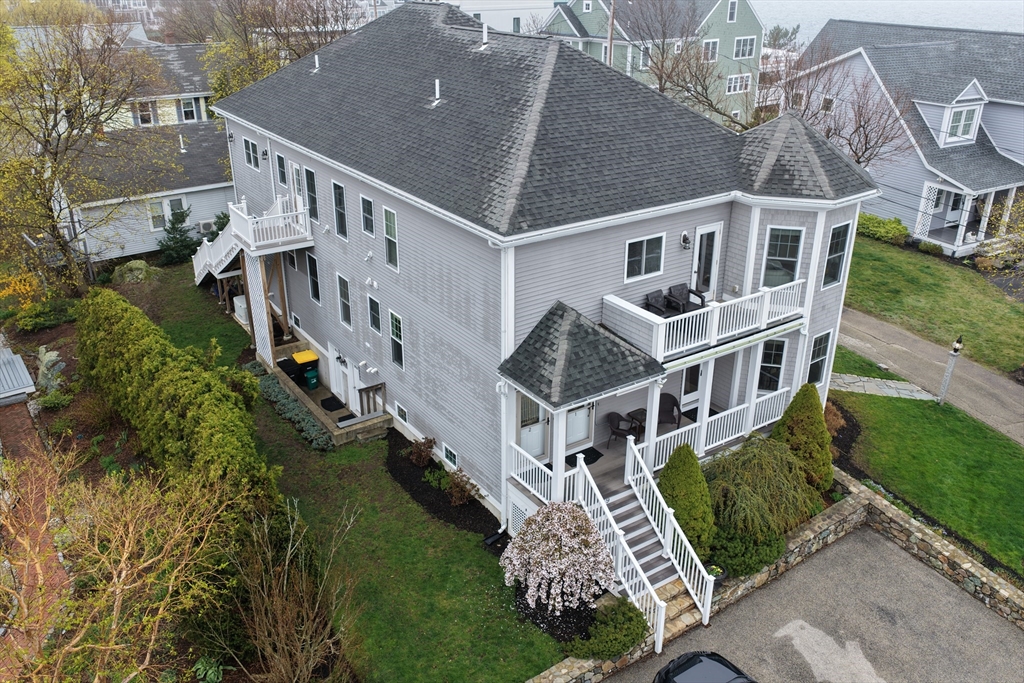 9 Meade Avenue, Unit 1 Hull, MA 02045 - Photo 32 of 34 an aerial view of a house with a yard