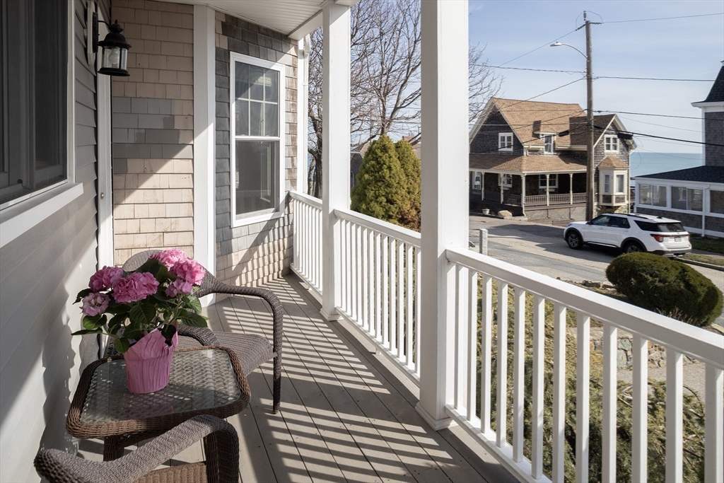 9 Meade Avenue, Unit 1 Hull, MA 02045 - Photo 7 of 34 a view of a balcony with chairs