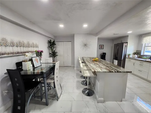 a view of a dining room with furniture
