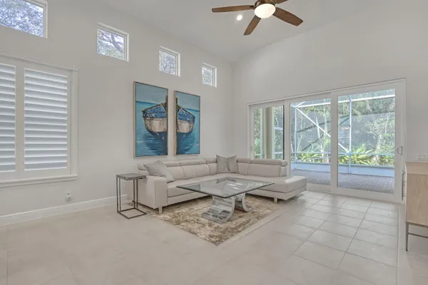 a view of entryway with furniture and wooden floor