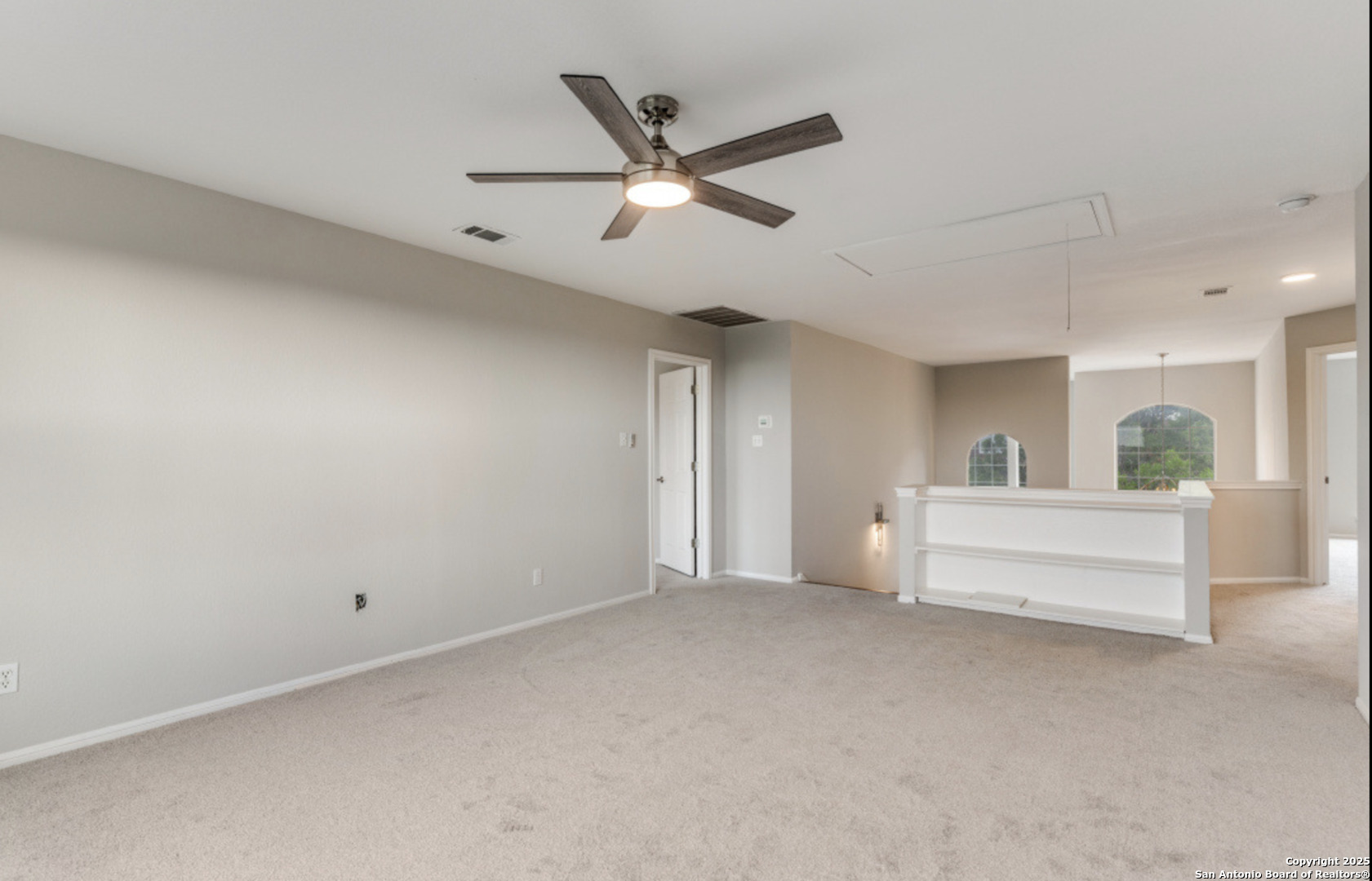 19431 Camino Ridge San Antonio, TX 78258 - Photo 12 of 25 a view of an empty room and window