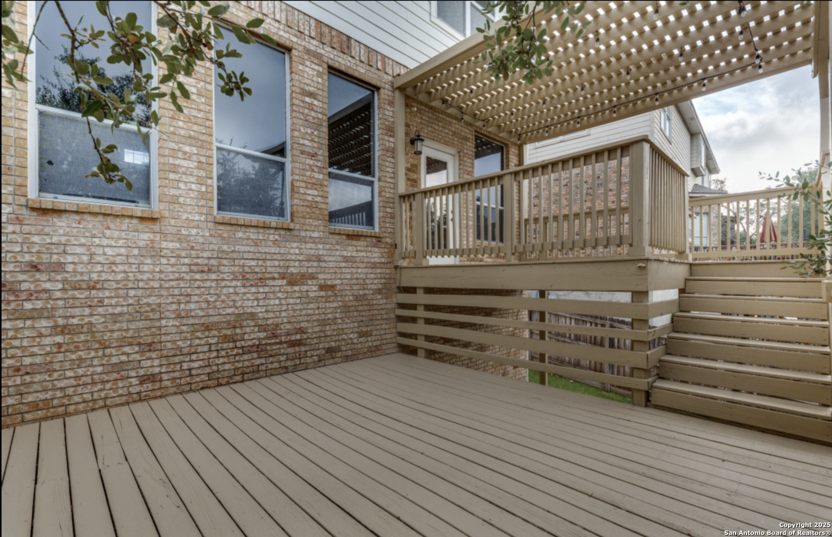 19431 Camino Ridge San Antonio, TX 78258 - Photo 2 of 25 a view of a pathway with a house